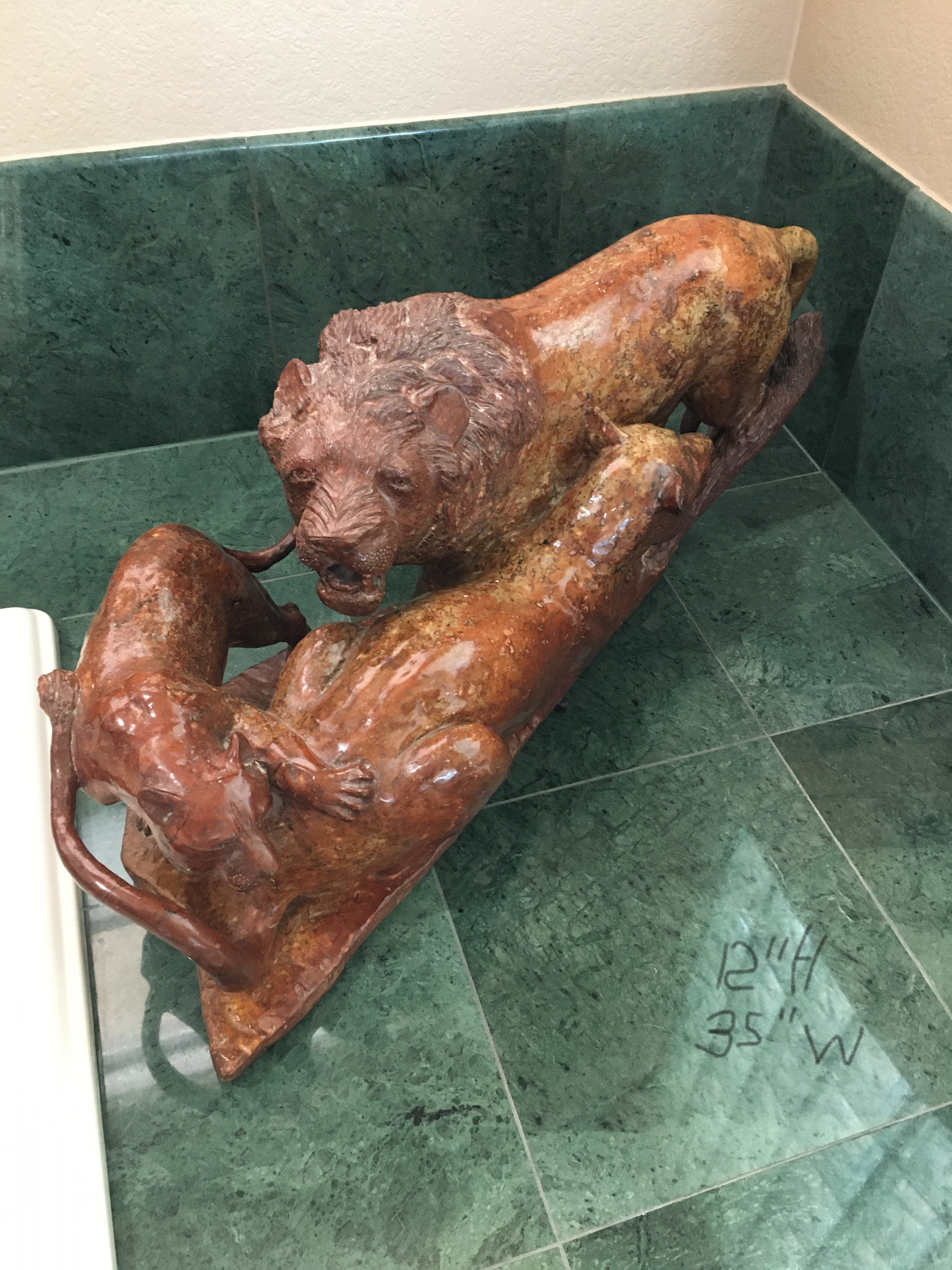 Stone Carved Lion Family